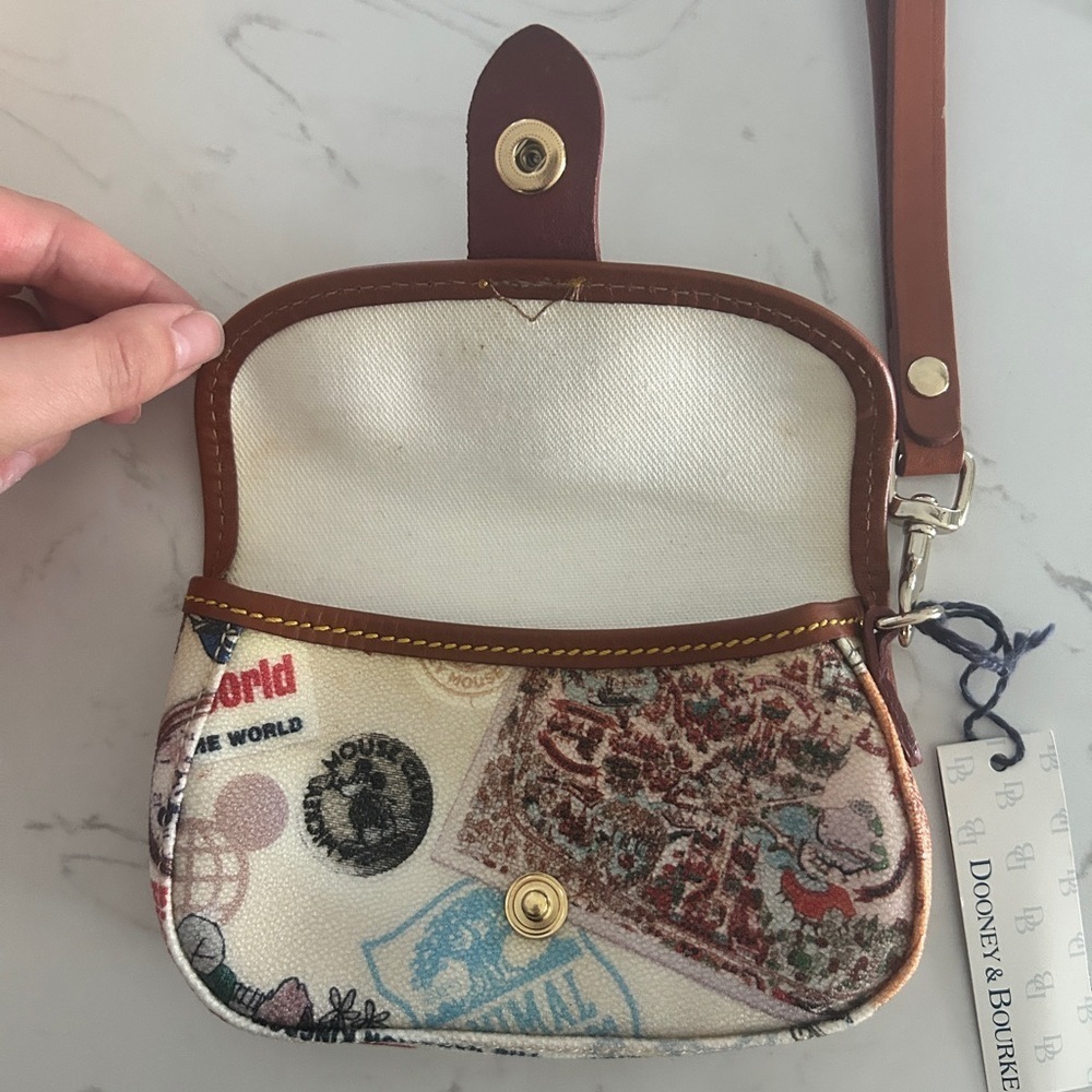 Dooney & Bourke Disney Parks Wristlet -Vintage Postcard Magic Kingdom Print- NWT - Picture 8 of 11